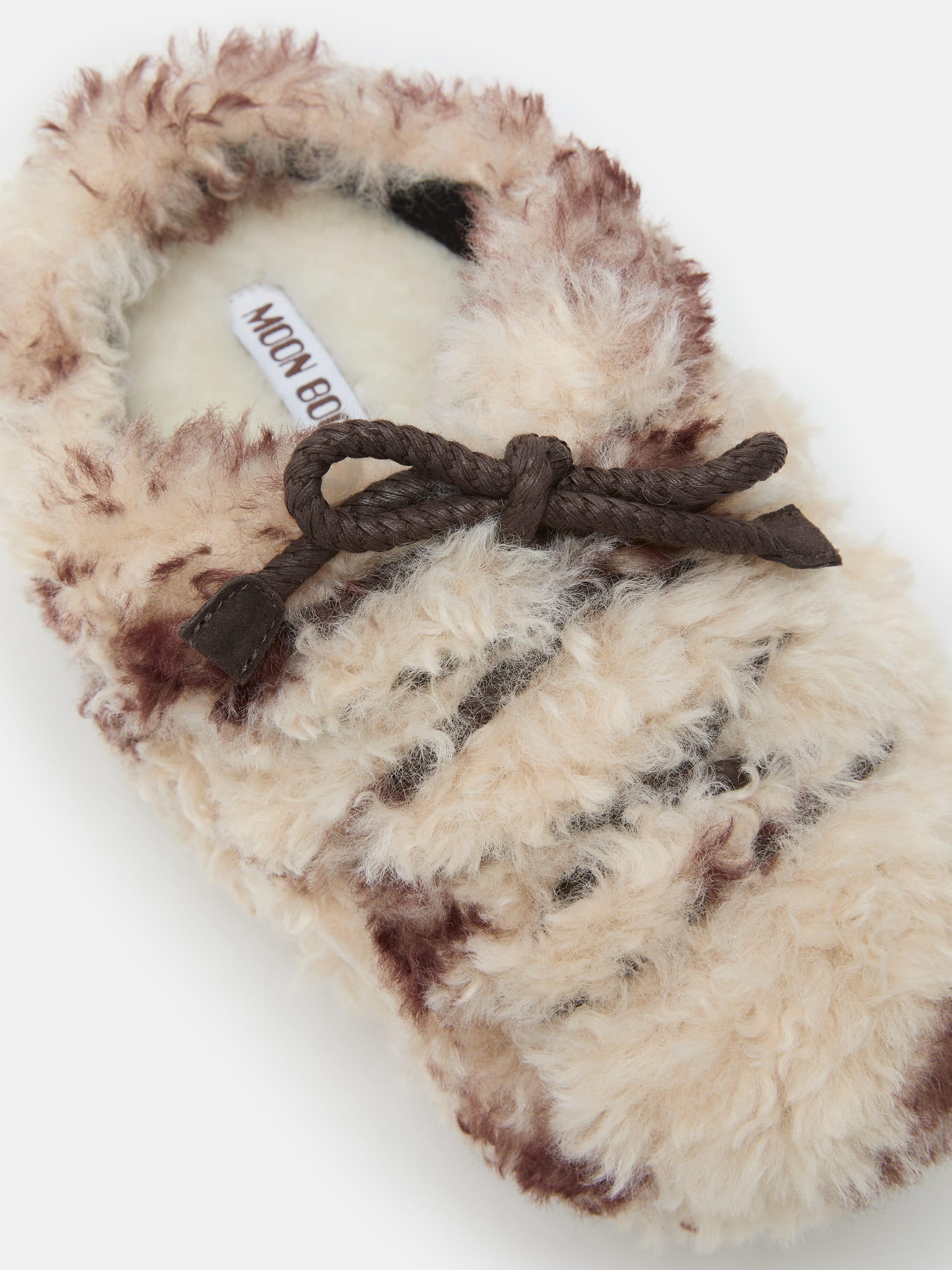 EVX COW PRINT CURLY MULES