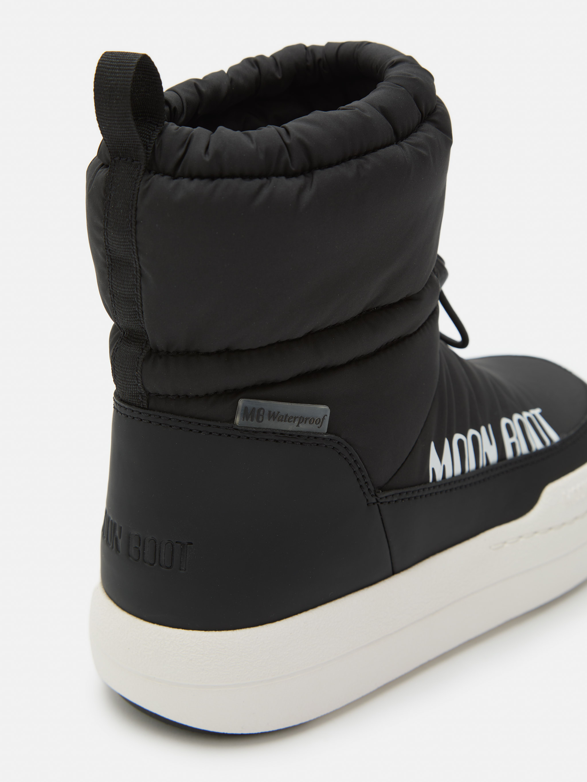 JUNIOR PARK BLACK TUBE MID BOOTS